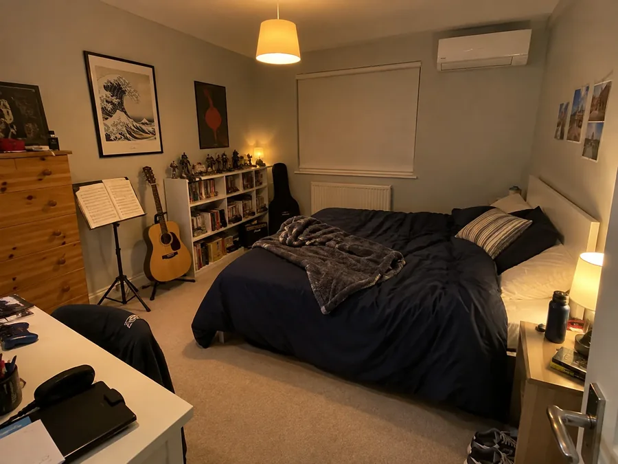 Bedroom used for music practice, with the air conditioning fitted