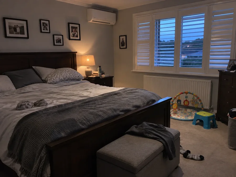 Family bedroom in the evening with the air conditioning fitted