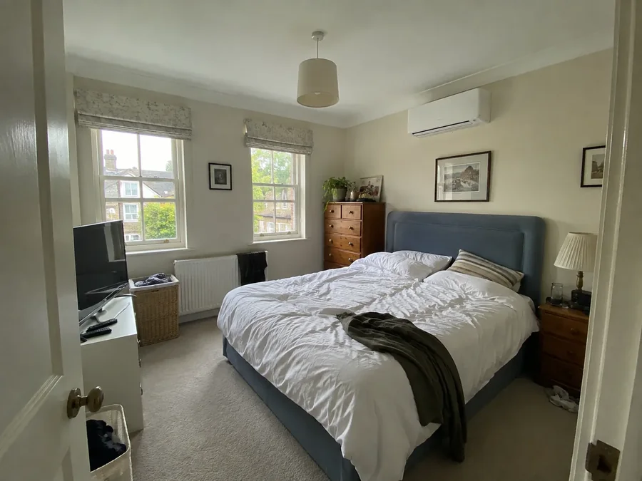 Bedroom the day after fitting, unit high on the wall and nothing left behind