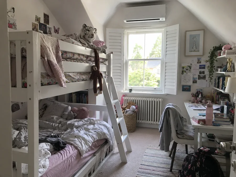 Children's room with bunk beds and the air conditioning fitted